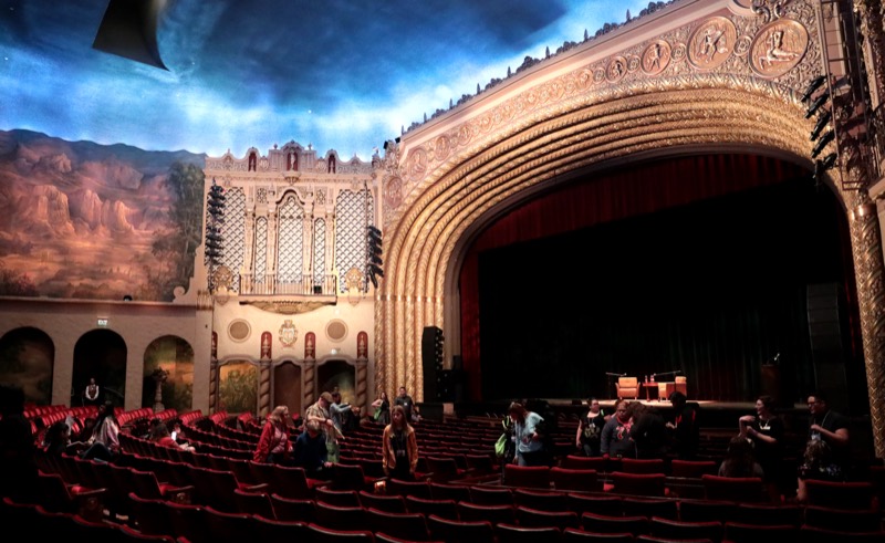 Inside the Orpheum Theatre in Phoenix, painted sky ceiling over the red seats